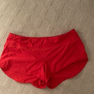 LULULEMON SPEED UP SHORTS IN RED